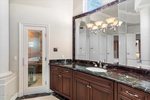 a view of a balcony with furniture