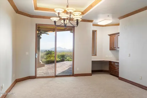 a view of a street with a building in the background