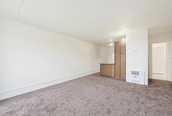 an empty room with windows