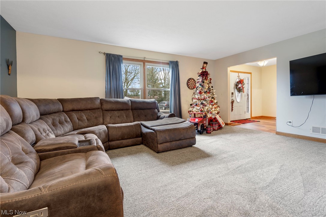 4915 Monticello Street Northwest Canton, OH 44708 - Photo 9 of 31 View of carpeted living room