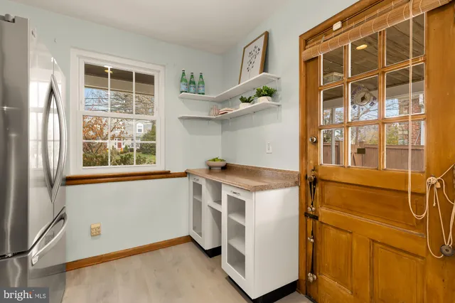 a kitchen with a stove and a microwave