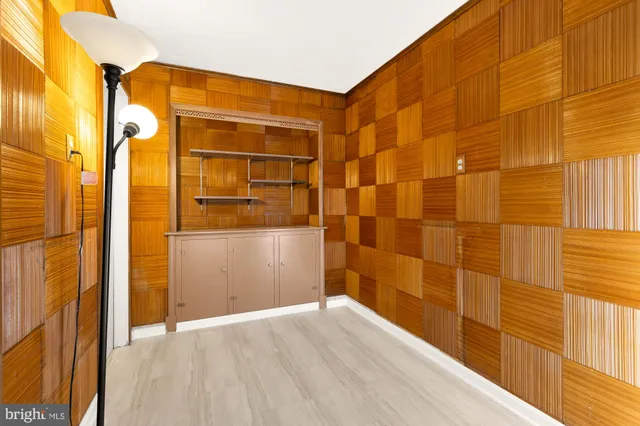 a view of a hallway with washer and dryer