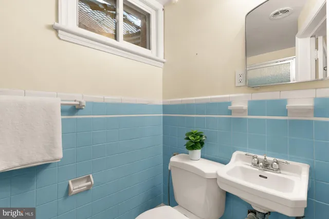 a view of a house with a yard and garage