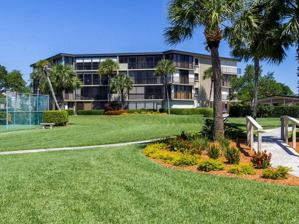 a view of a sign in front of a house