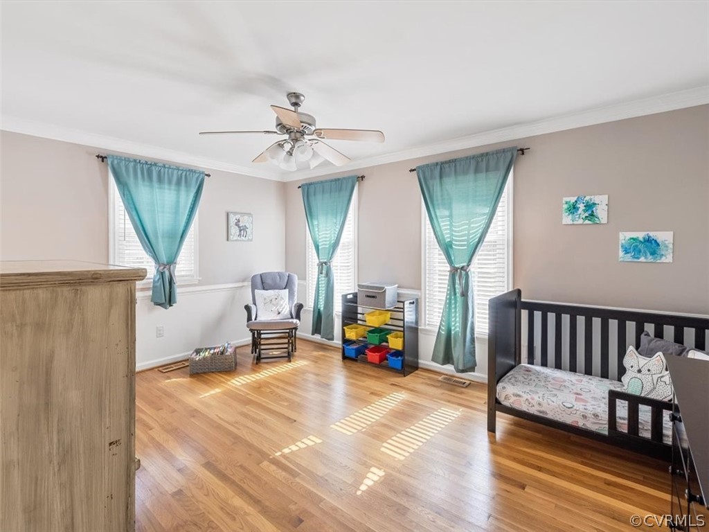 10417 River Road Petersburg, VA 23803 - Photo 18 of 29 a bedroom with furniture and a window