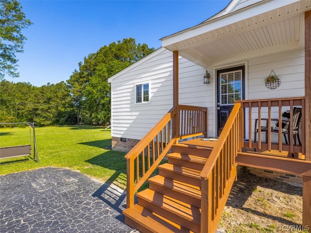 10417 River Road Petersburg, VA 23803 - Photo 23 of 29 a view of a house with backyard and sitting area