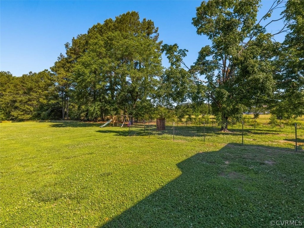 10417 River Road Petersburg, VA 23803 - Photo 24 of 29 a view of an outdoor space and swimming pool