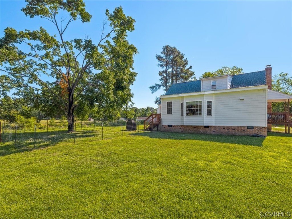 10417 River Road Petersburg, VA 23803 - Photo 26 of 29 a view of a house with a big yard