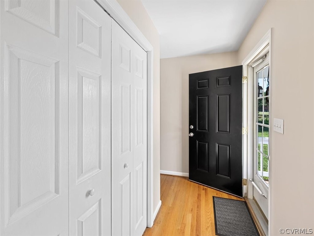 10417 River Road Petersburg, VA 23803 - Photo 4 of 29 a view of a hallway with wooden floor