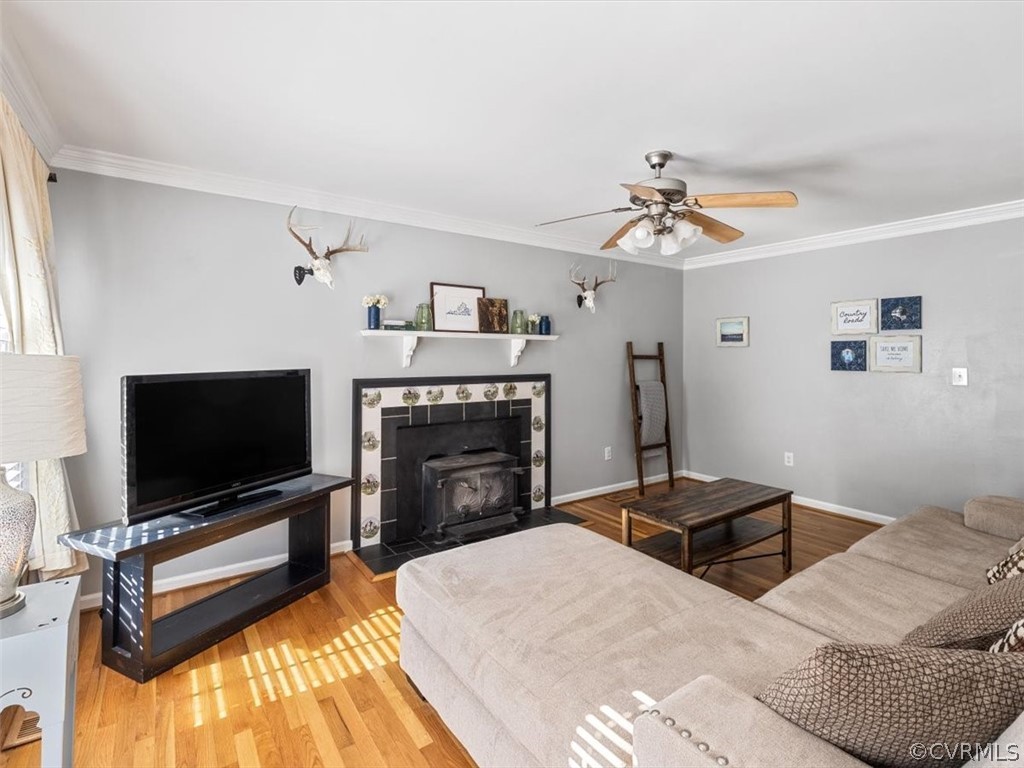 10417 River Road Petersburg, VA 23803 - Photo 5 of 29 a living room with furniture and a flat screen tv