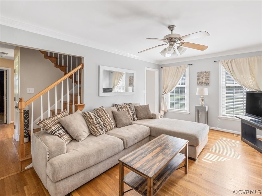 10417 River Road Petersburg, VA 23803 - Photo 6 of 29 a living room with furniture ceiling fan and a wooden floor