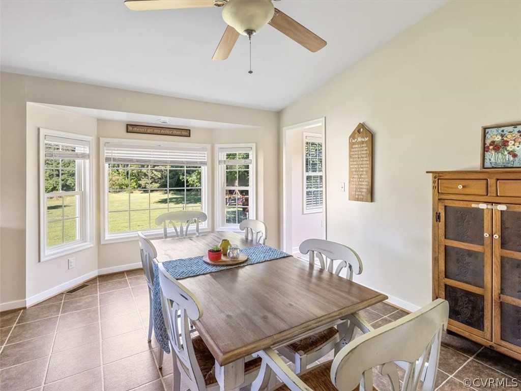 10417 River Road Petersburg, VA 23803 - Photo 9 of 29 a view of a dining room with furniture window and wooden floor