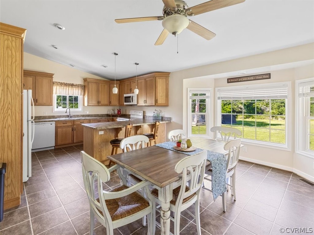 10417 River Road Petersburg, VA 23803 - Photo 10 of 29 a view of a dining room with furniture window and wooden floor