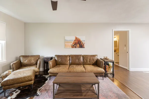 a living room with furniture and a couch