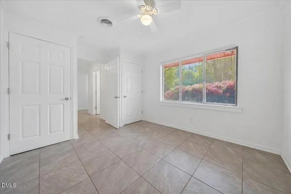 a bathroom with a toilet and a vanity