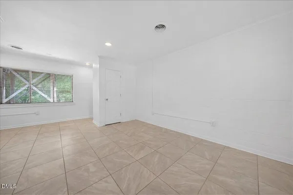 an empty room with windows