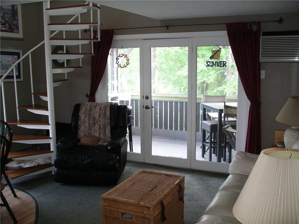 1801 Post Road, Unit 183B Wells, ME 04090 - Photo 6 of 19 Living room with entry to porch and...