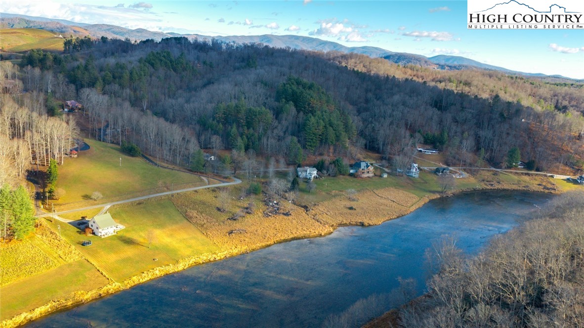 a view of a swimming pool with an outdoor seating