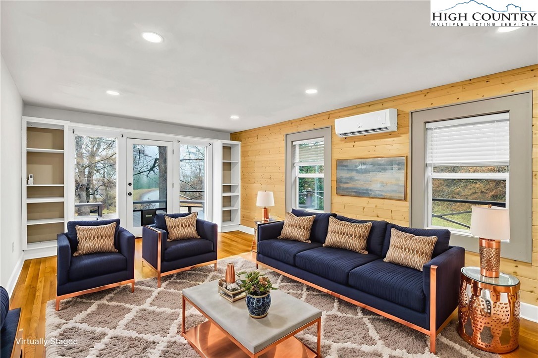 7 Legra Road Grassy Creek, NC 28631 - Photo 11 of 35 a living room with furniture and a large window