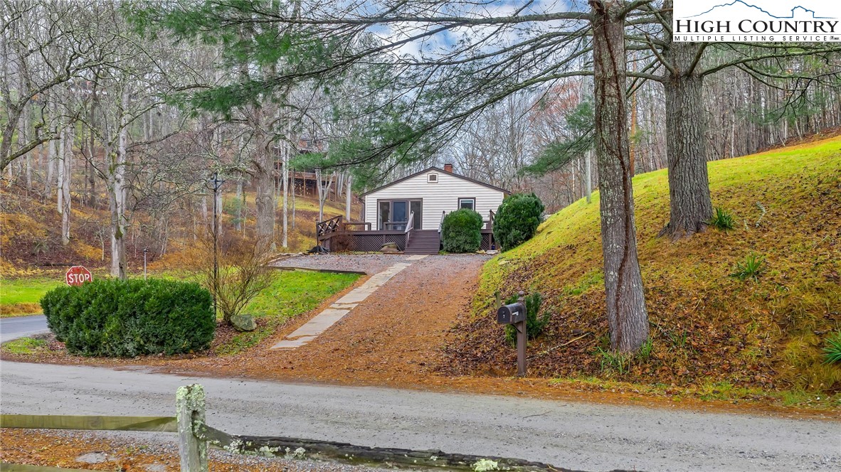 7 Legra Road Grassy Creek, NC 28631 - Photo 2 of 35 a view of a house with a yard