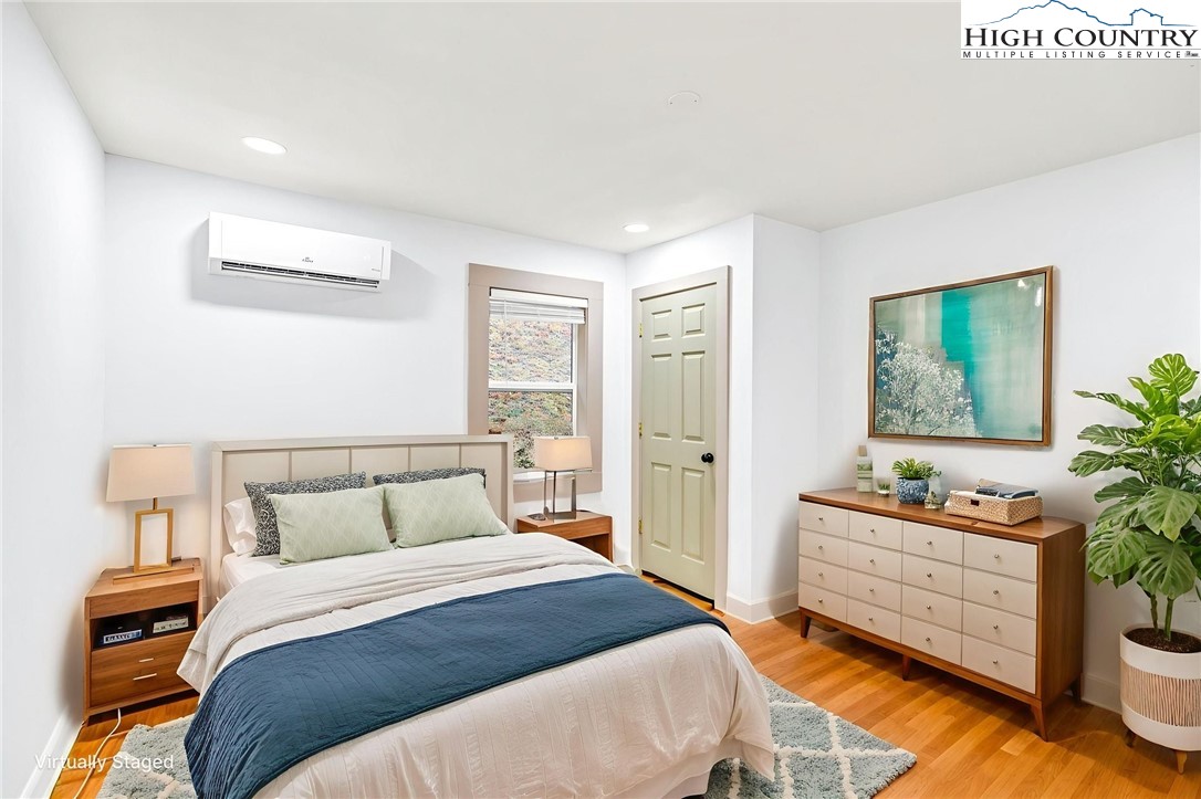 7 Legra Road Grassy Creek, NC 28631 - Photo 21 of 35 a bedroom with a bed and a window