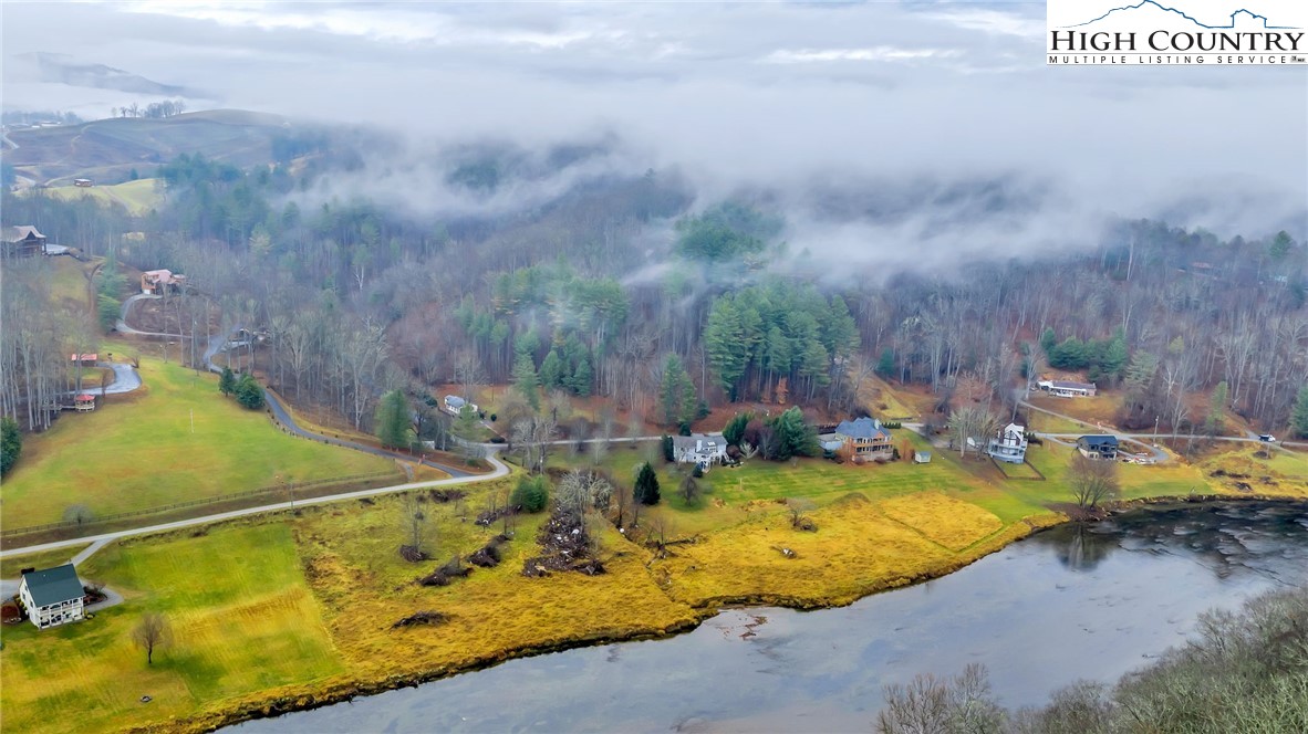 7 Legra Road Grassy Creek, NC 28631 - Photo 3 of 35 an aerial view of a swimming pool