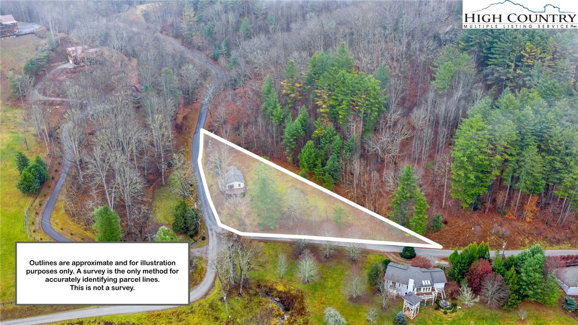7 Legra Road Grassy Creek, NC 28631 - Photo 32 of 35 a view of swimming pool with a outdoor seating