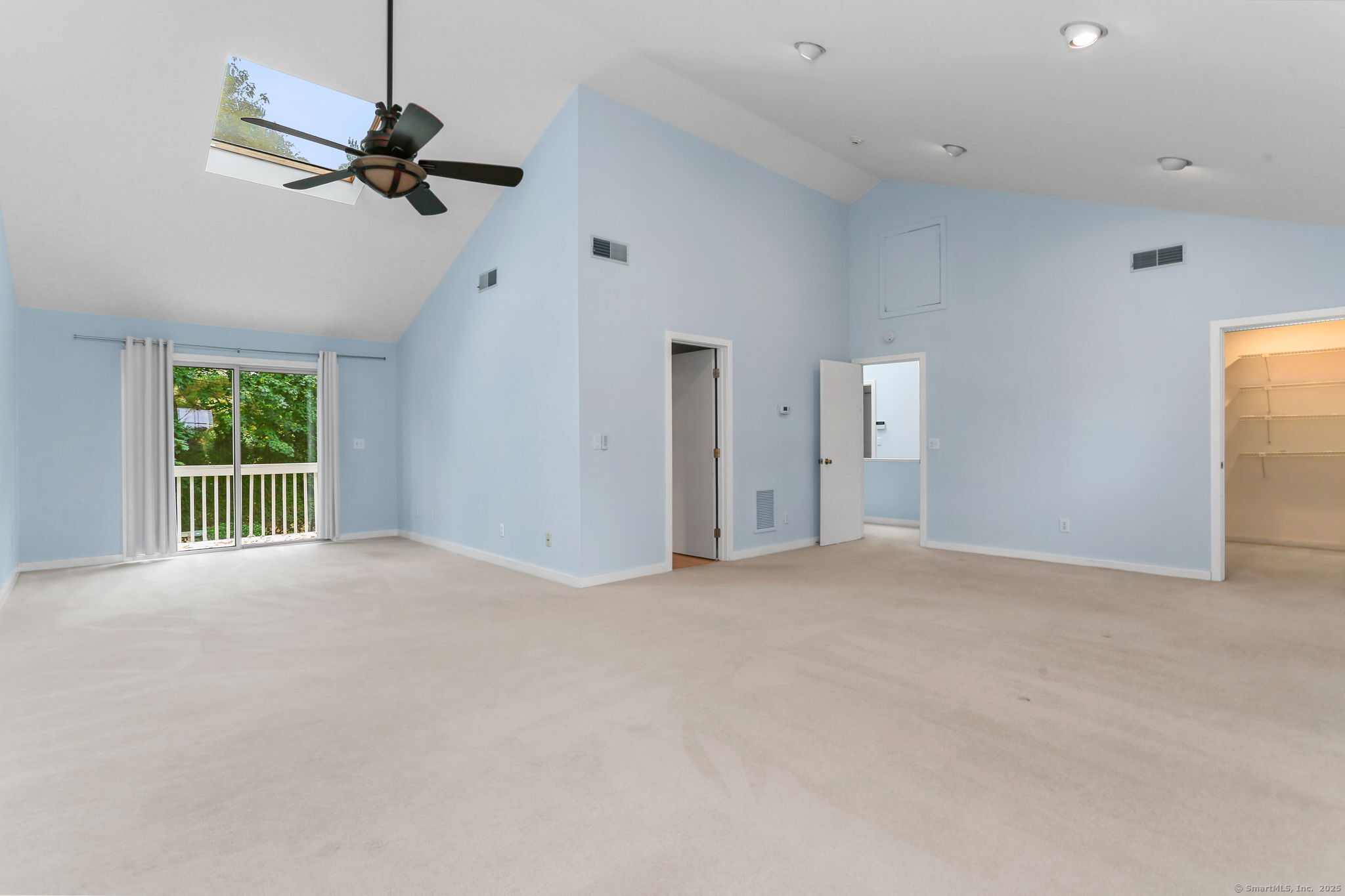 90 Sasco Hill Terrace Fairfield, CT 06824 - Photo 11 of 19 a view of a livingroom with a ceiling fan and window