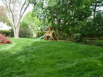 a view of a garden with a slide