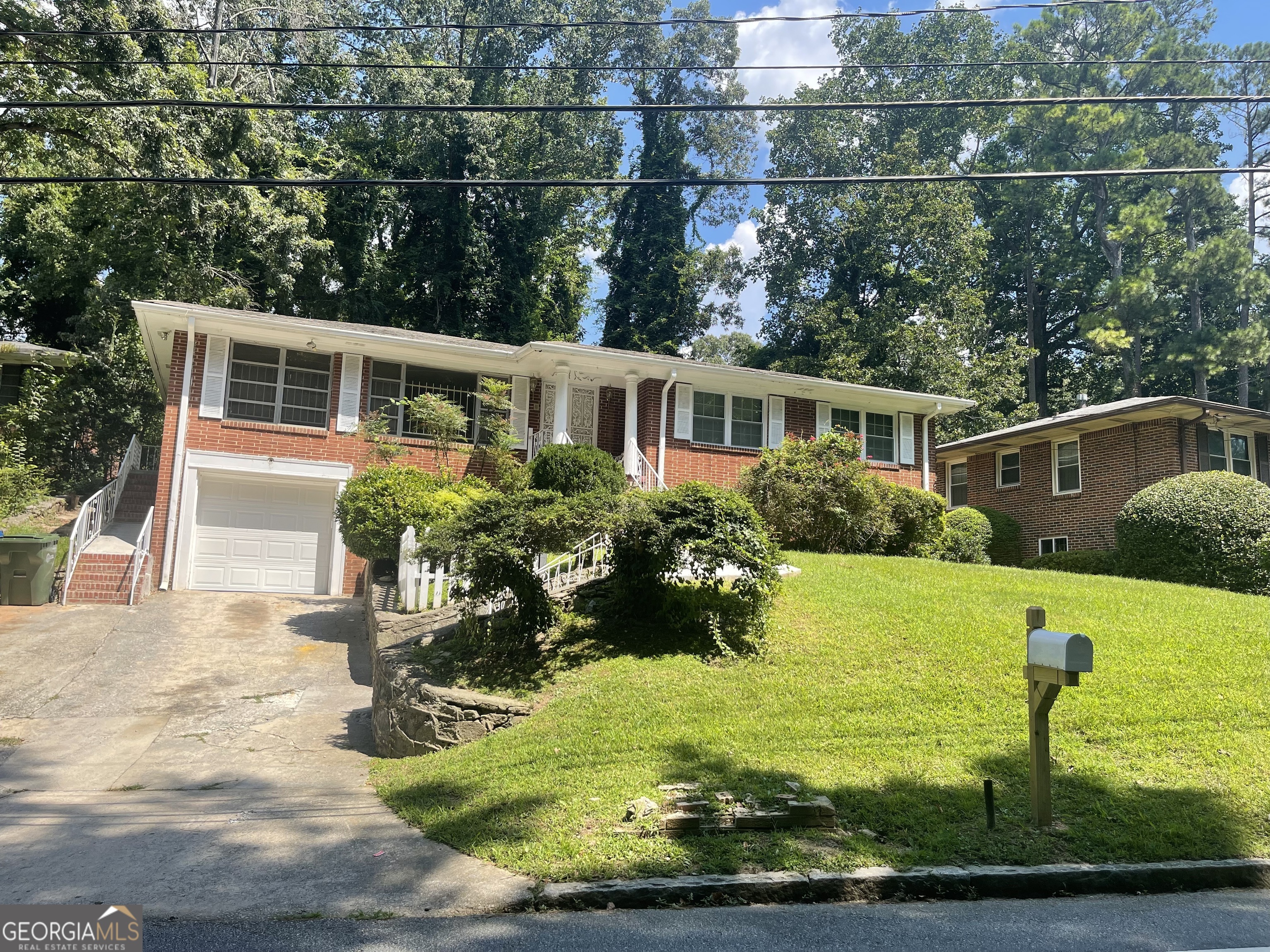 3027 Collier Drive Northwest Atlanta, GA 30318 - Photo 2 of 24 a view of a house with backyard