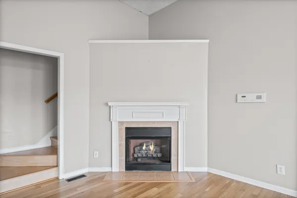 a living room with a fireplace