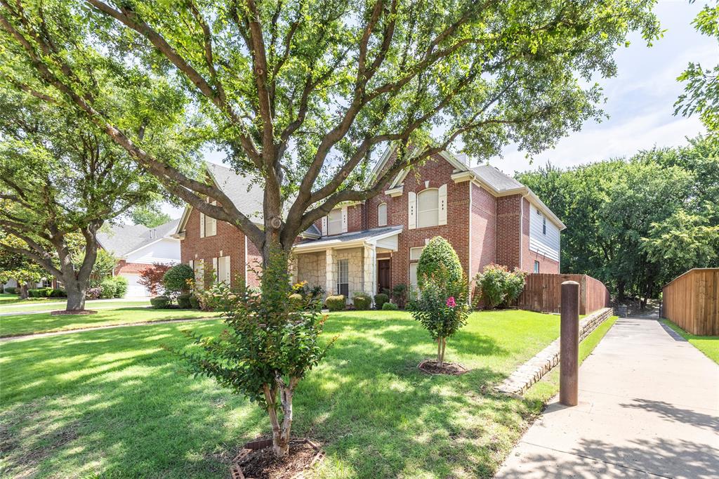 220 Justin Road Murphy, TX 75094 - Photo 2 of 40 View of front facade with brick siding and stone siding
