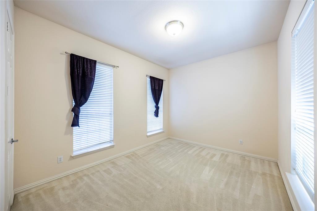 220 Justin Road Murphy, TX 75094 - Photo 21 of 40 Unfurnished room with carpet flooring and baseboards