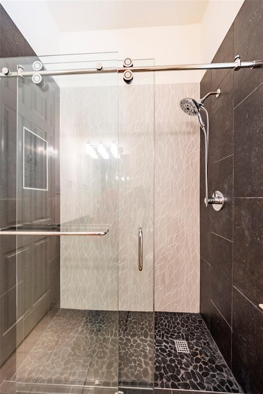 220 Justin Road Murphy, TX 75094 - Photo 23 of 40 Full bathroom featuring a stall shower