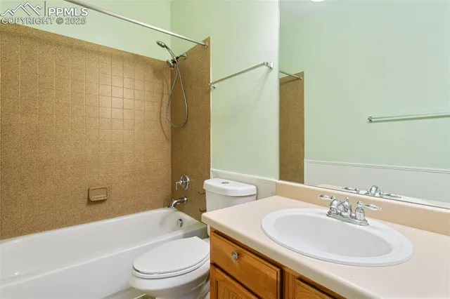 a view of balcony with wooden floor and seating space