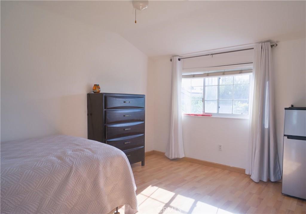 1312 Durham Street Simi Valley, CA 93065 - Photo 2 of 10 a bedroom with a bed and a mirror