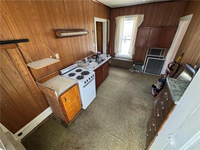 a view of kitchen and utility room