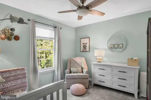 a bathroom with a sink toilet and mirror