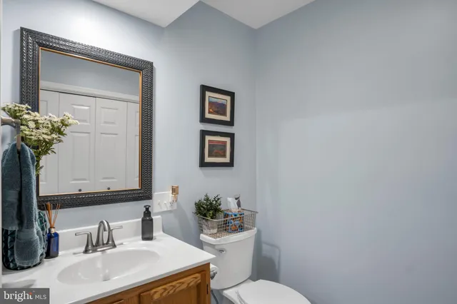 a dining room with furniture and a window