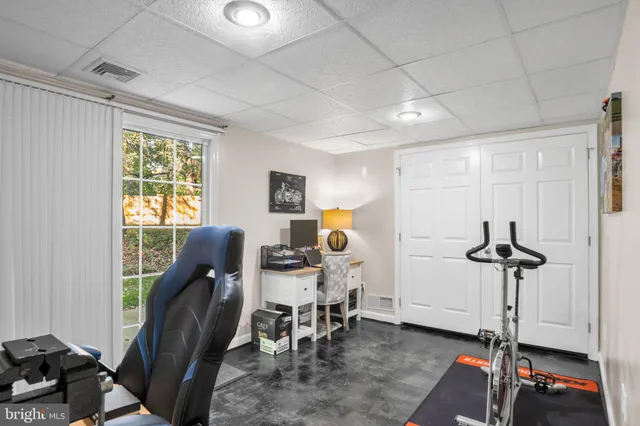 a view of a backyard with a chair