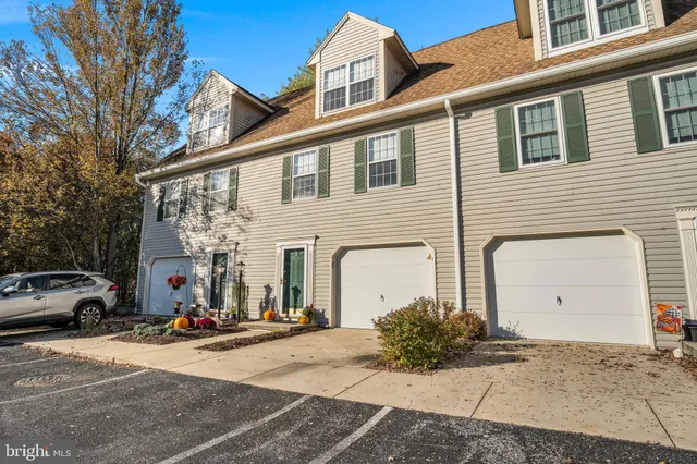 a view of a street with cars