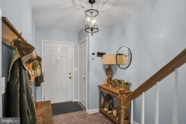 a kitchen with stainless steel appliances granite countertop sink and a stove