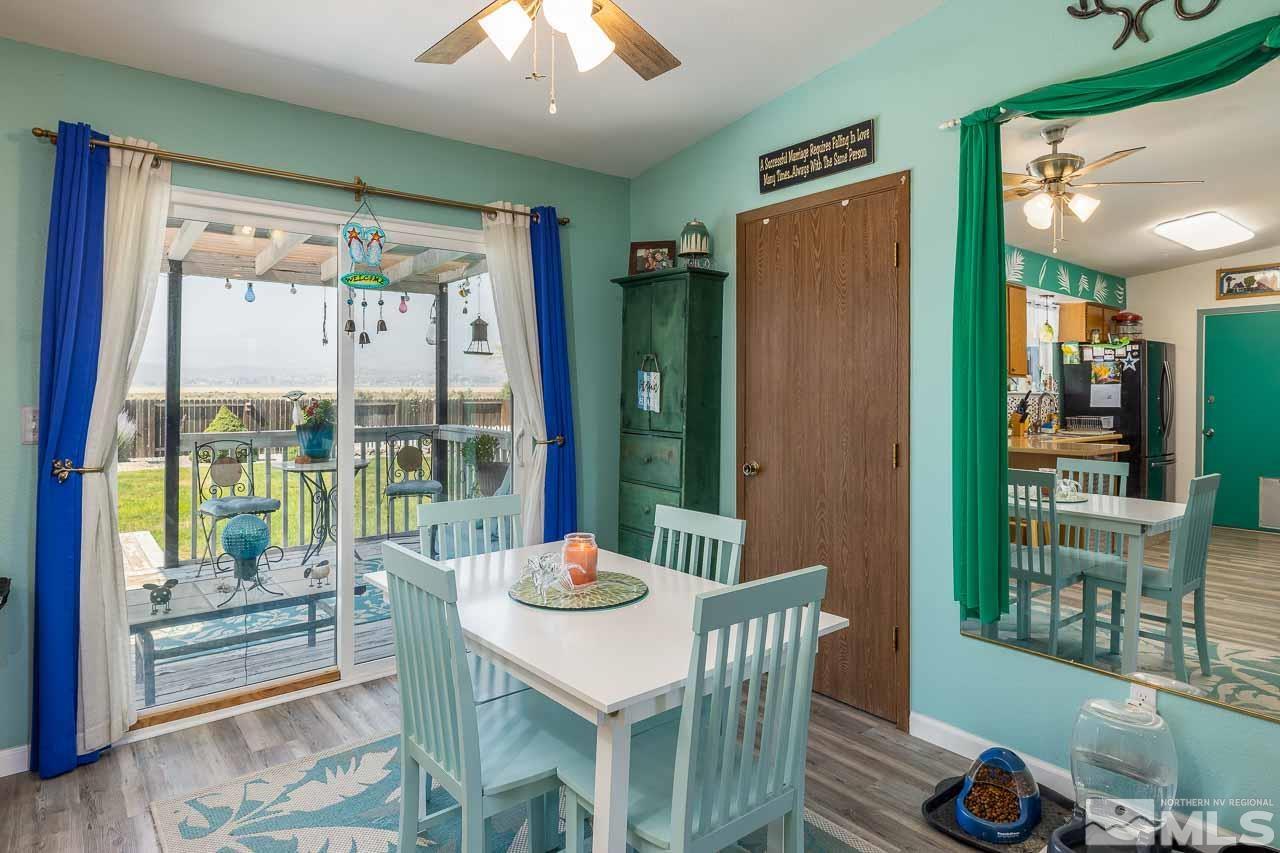3460 Canvasback Lane Reno, NV 89508 - Photo 16 of 35 a view of a dining room with furniture window and outside view