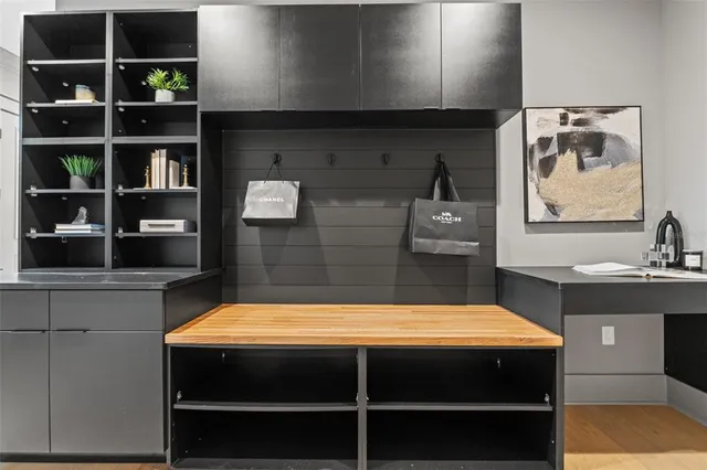 a kitchen with a sink and cabinets