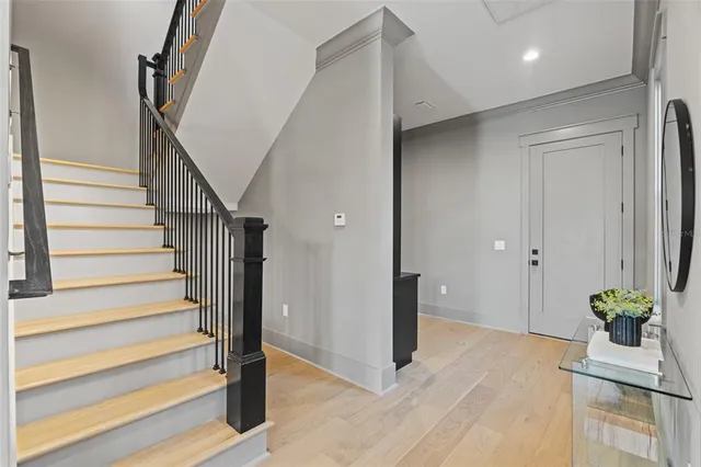 a view of n empty room with a window