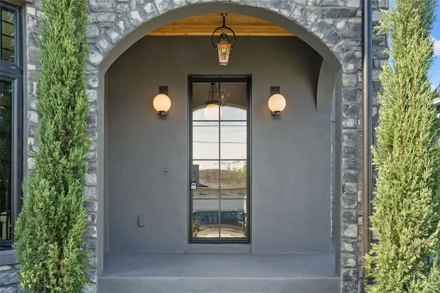 a bedroom with bed and a window