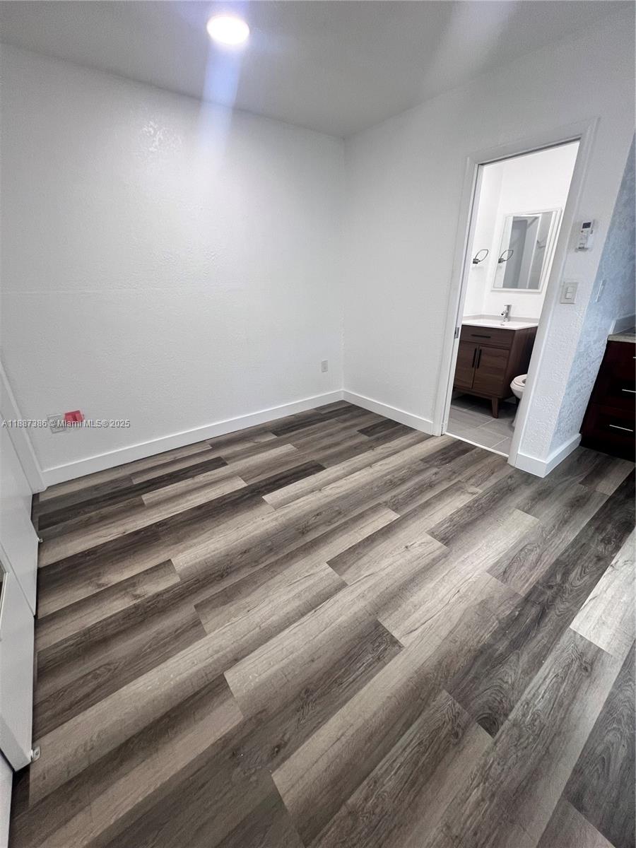 14763 Southwest 173rd Terrace Miami, FL 33187 - Photo 8 of 22 a utility room with washer and dryer