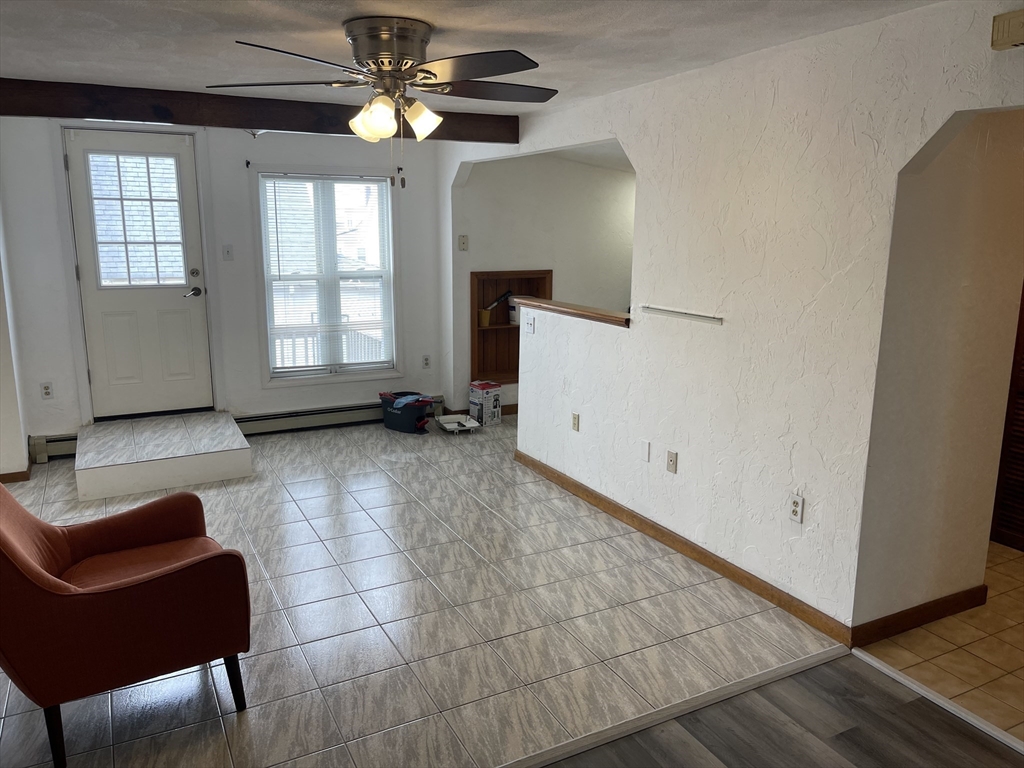 9 Gilmore Street, Unit 3 Everett, MA 02149 - Photo 1 of 11 a view of an empty room with a window