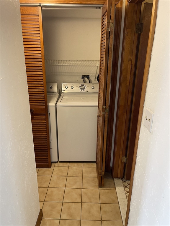 9 Gilmore Street, Unit 3 Everett, MA 02149 - Photo 8 of 11 a utility room with dryer and washer