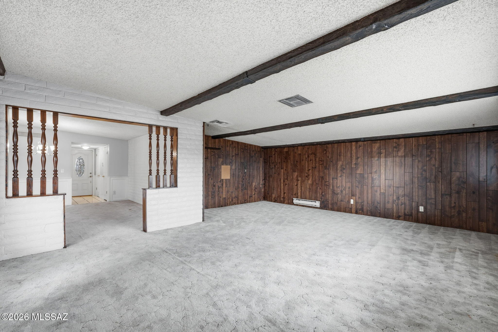 7381 East Stella Road Tucson, AZ 85730 - Photo 11 of 33 View form the family room into the formal dining room